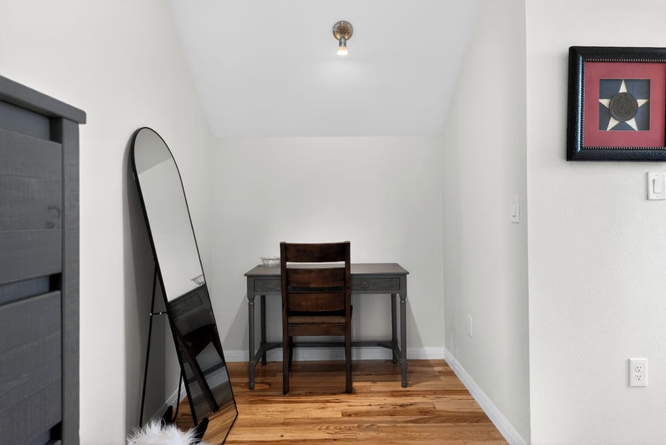 Bedroom 2 features a queen bed and an ensuite bathroom.