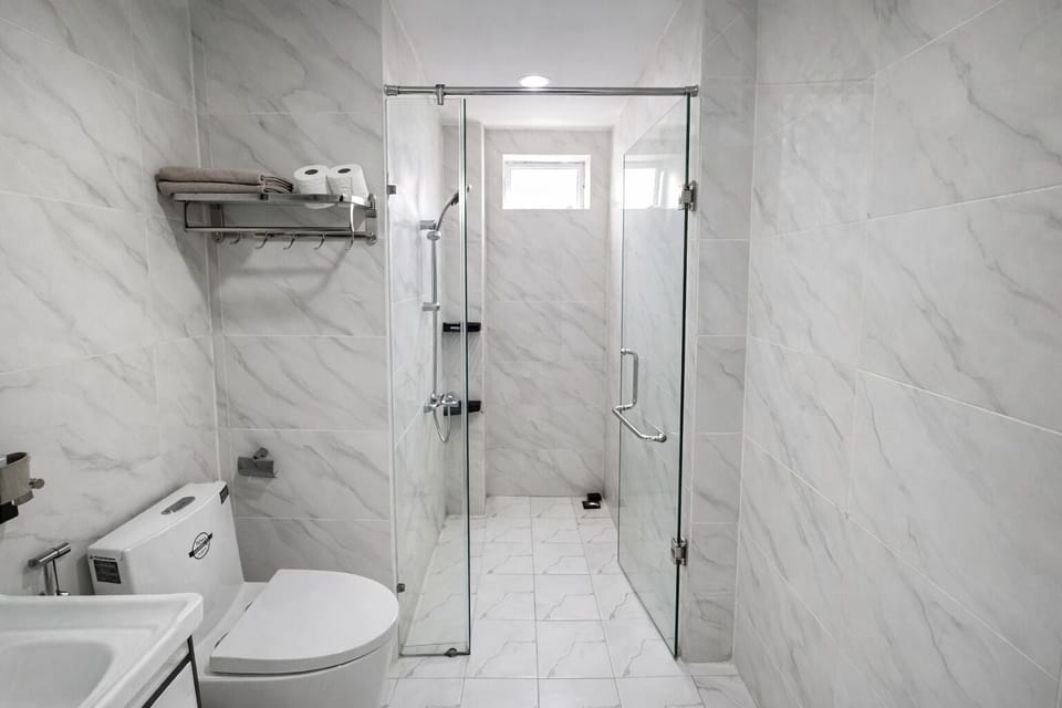 Shower, free toiletries, towels, soap