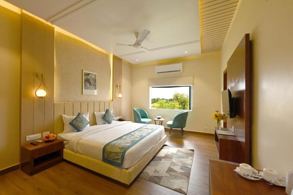 Deluxe Room, Garden View | In-room safe, iron/ironing board, free WiFi