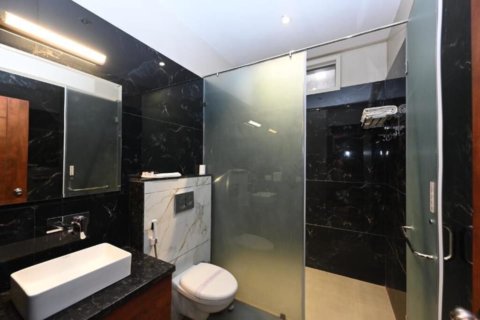 Shower, slippers, towels, soap