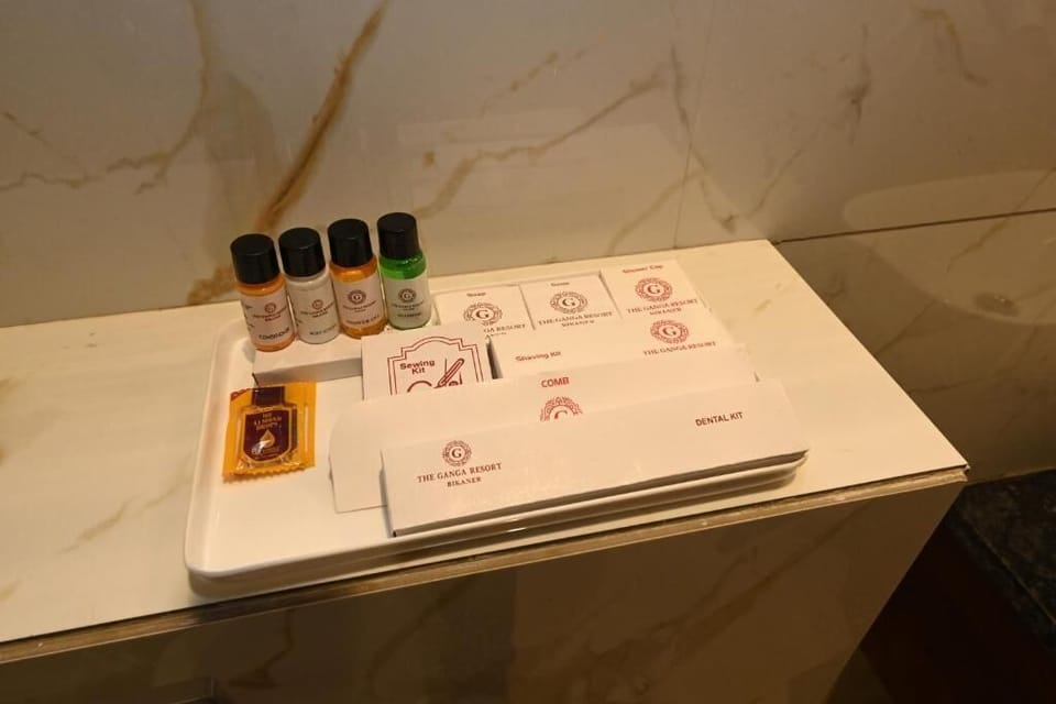 Shower, slippers, towels, soap