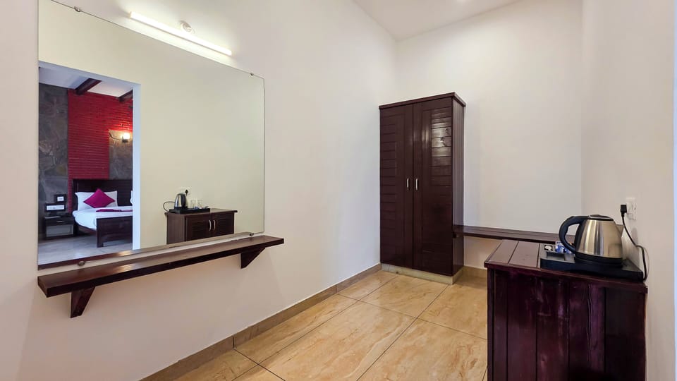 Premium Double Room | Living area | 32-inch LED TV with satellite channels