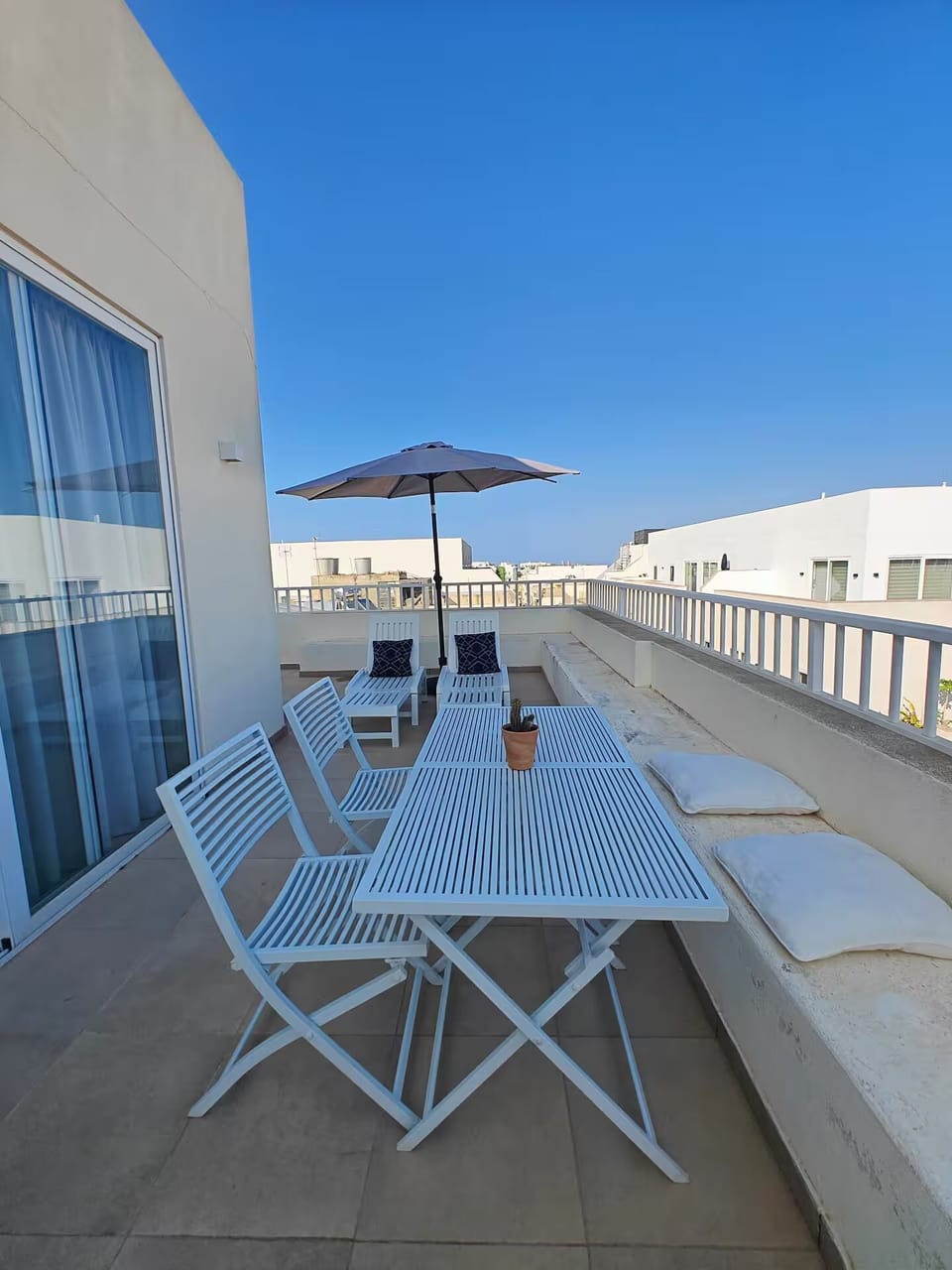 Penthouse, City View | Outdoor dining
