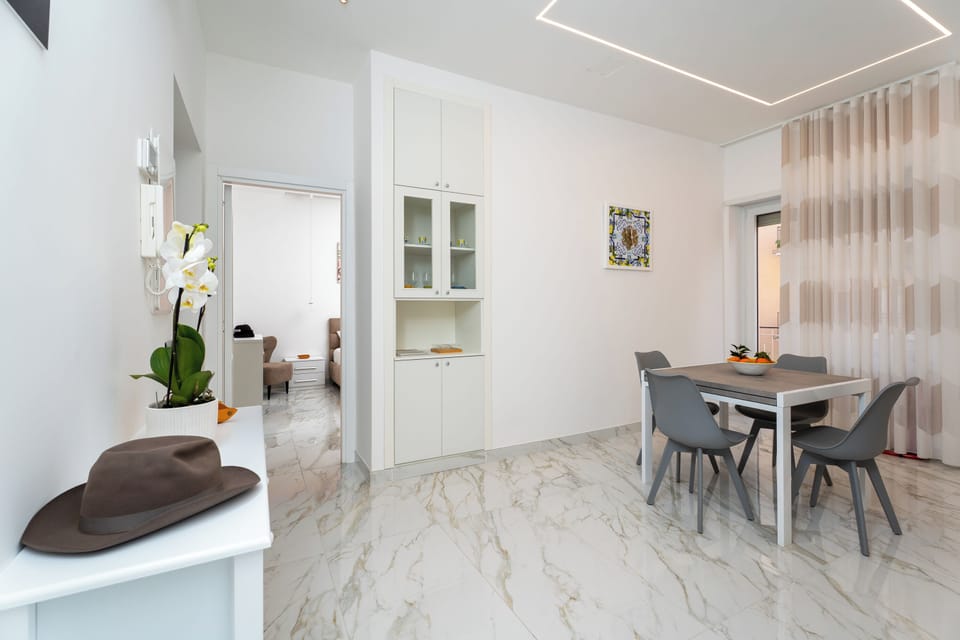 Apartment, 2 Bedrooms, Kitchen, City View | Living area | 32-inch flat-screen TV with digital channels
