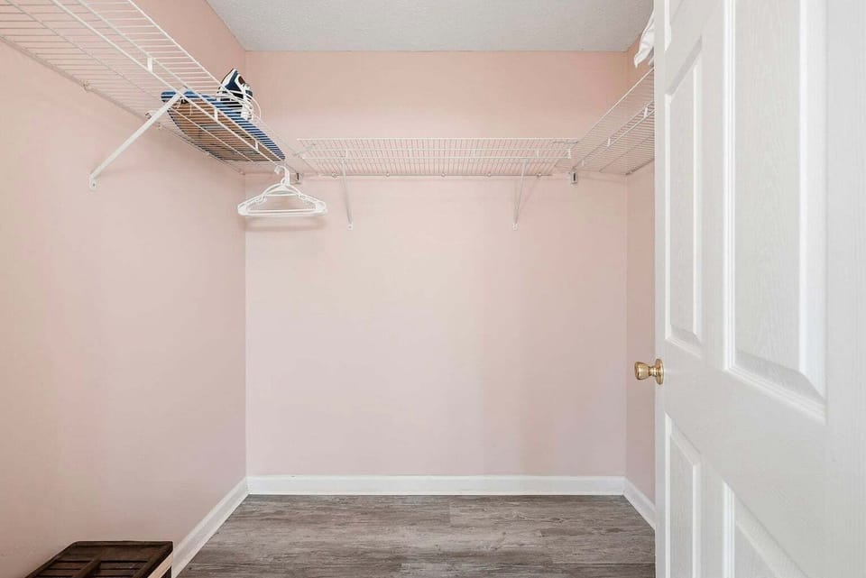 Master bedroom closet in master bathroom