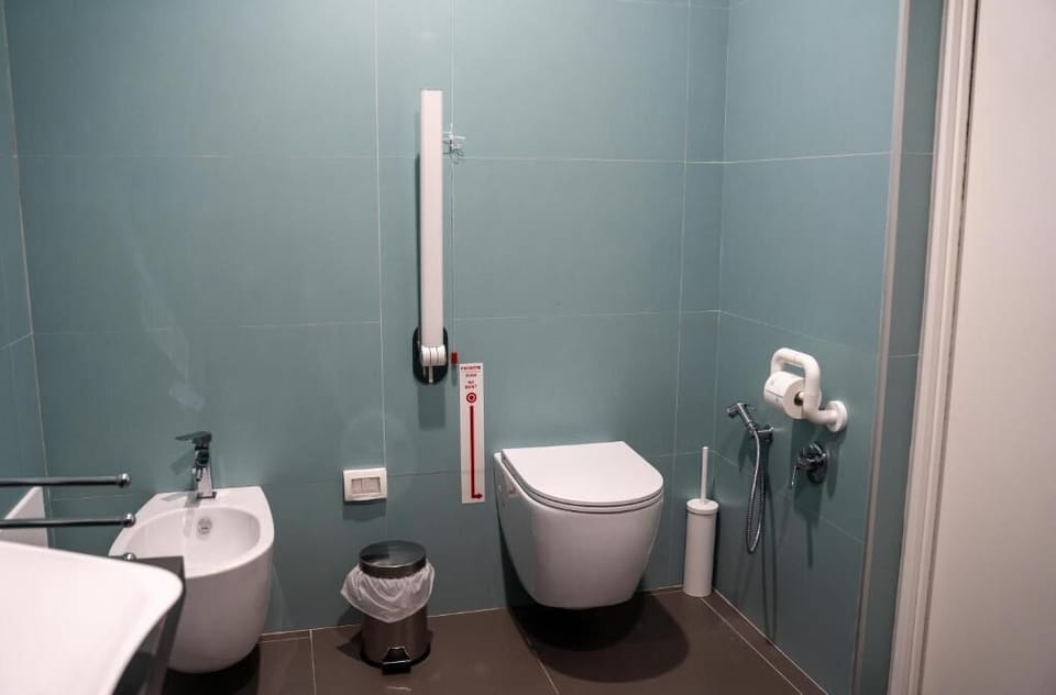Family Quadruple Room, Balcony | Bathroom | Free toiletries, hair dryer, bidet, towels