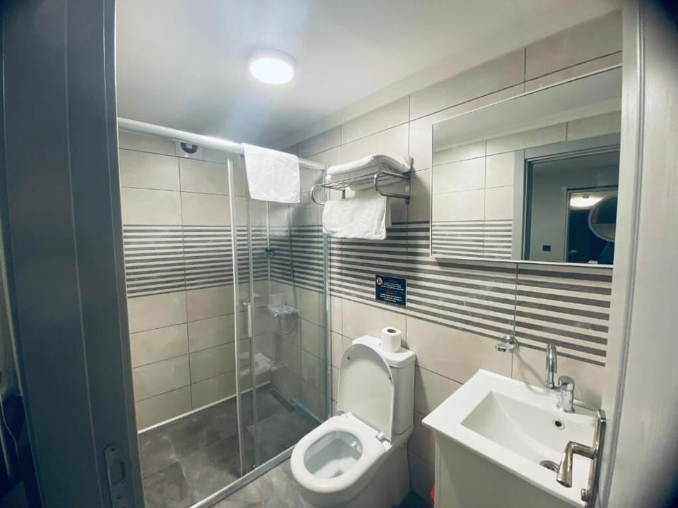 Shower, free toiletries, hair dryer, slippers