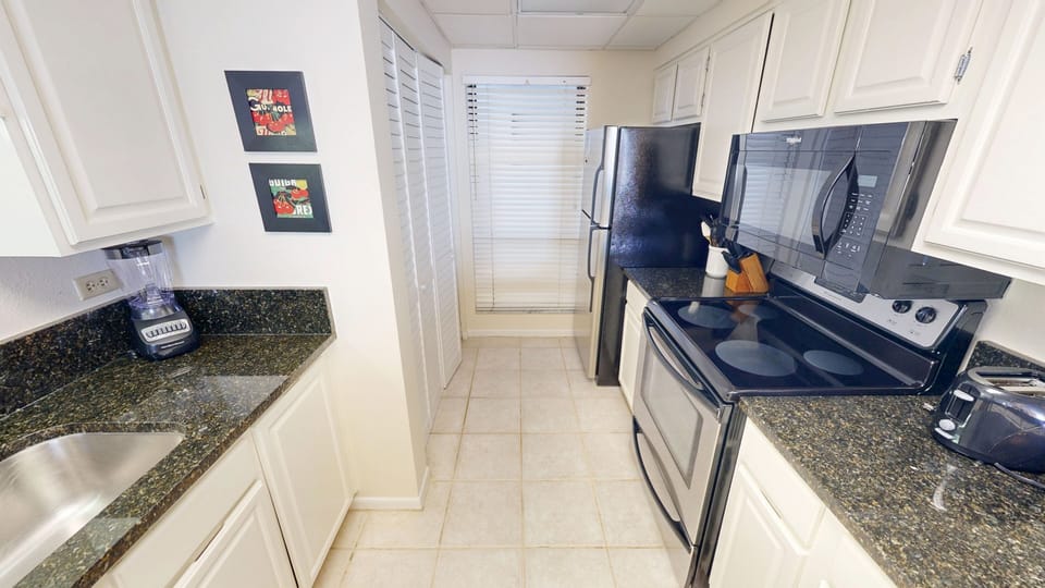Condo, 2 Bedrooms | Private kitchen | Coffee/tea maker, fridge, oven, toaster