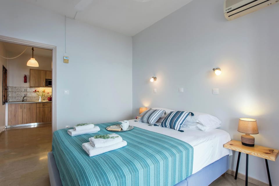 Bedroom 1: Inviting bedroom designed for relaxation, offering soft bedding, calming décor, and natural light.