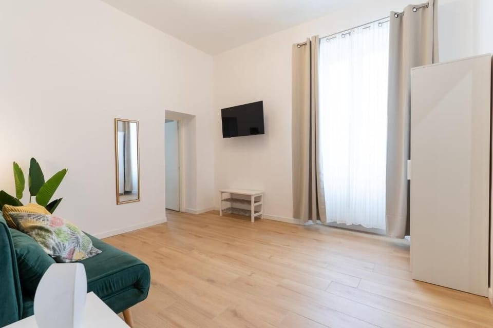 Suite, City View | Living area | TV