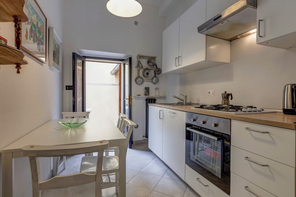 Apartment | Private kitchen | Fridge, stovetop, cookware/dishes/utensils