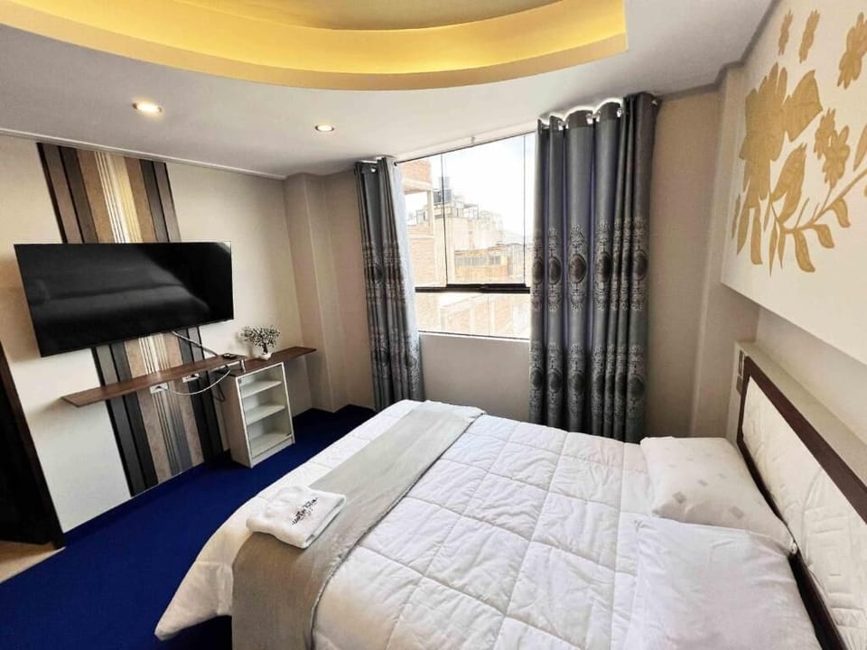 Down comforters, blackout drapes, iron/ironing board, free WiFi