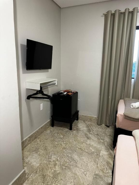 Standard Double Room, City View | Living area | 32-inch LED TV with digital channels