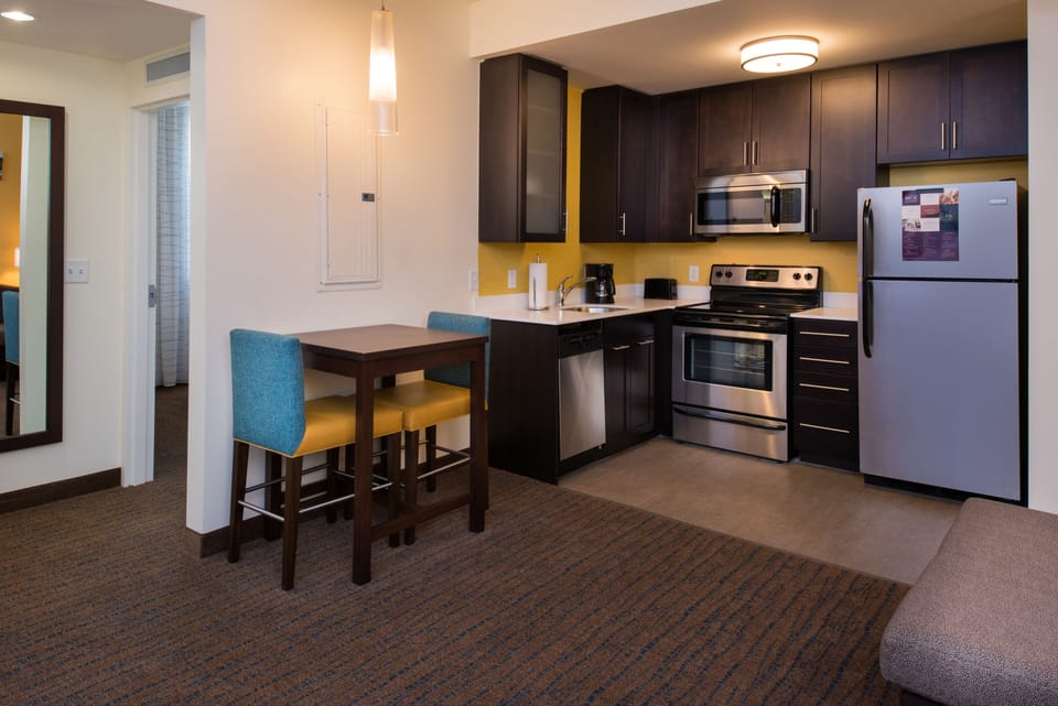 Full-size fridge, microwave, stovetop, coffee/tea maker