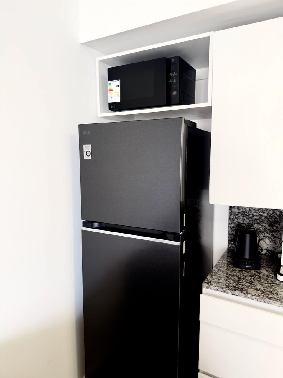 New LG silent inverter fridge and LG microwave.