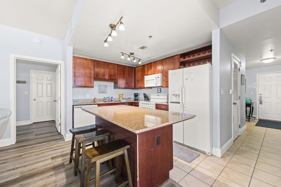 Fully Stocked Kitchen with Lake Views, Island Bar Seating and Drip Coffee Maker