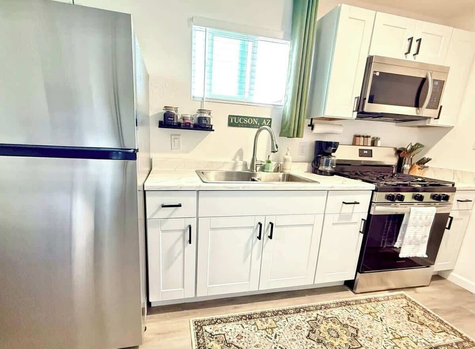Full kitchen, full size fridge and oven/stove along with coffee and tea to get your morning started right!