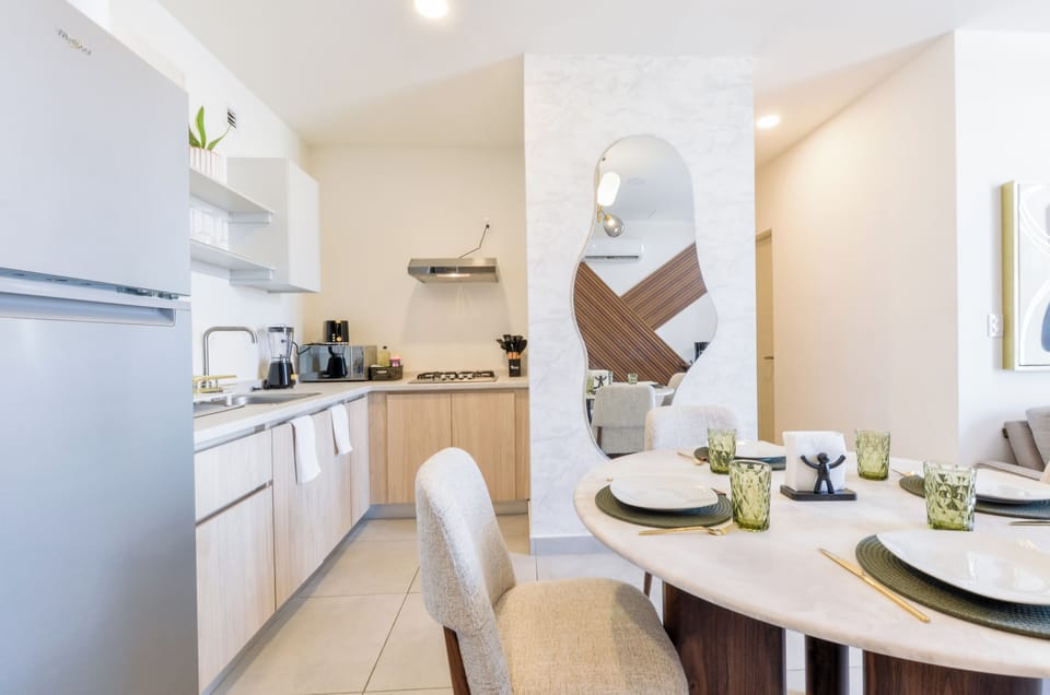 Junior Suite, City View | Private kitchen | Fridge, microwave, stovetop, blender