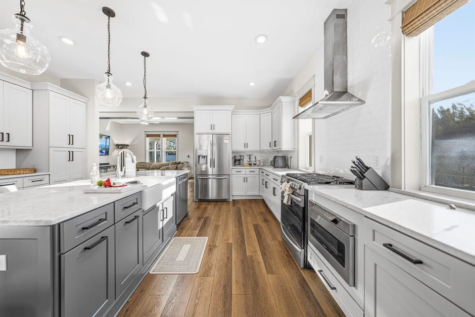 Cook like a pro on the brand-new gas cooktop with a sleek stainless steel range hood, ample counter space, and top-of-the-line appliances throughout — everything a home chef needs in this stunning Seminole Heights kitchen.