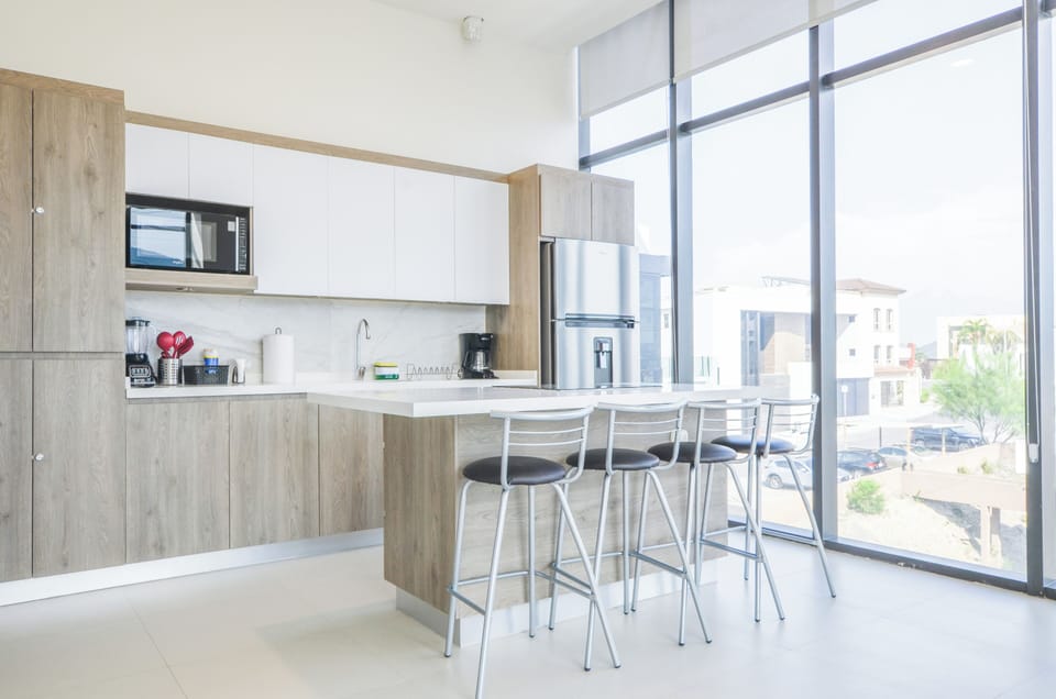 Suite, City View | Private kitchen | Full-size fridge, microwave, stovetop, griddle