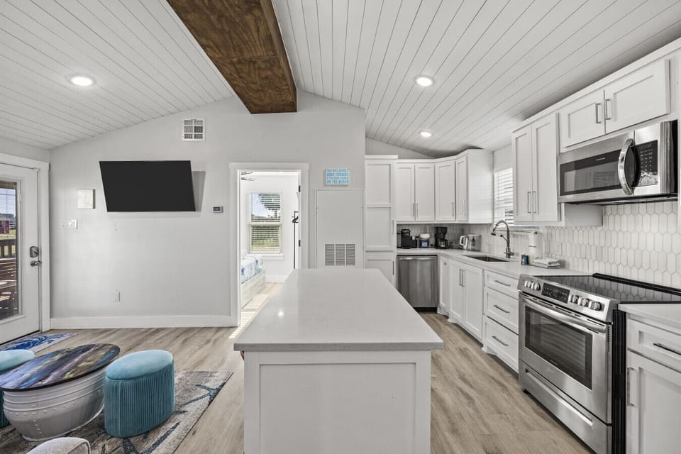 An open-concept kitchen and living area designed for easy gathering