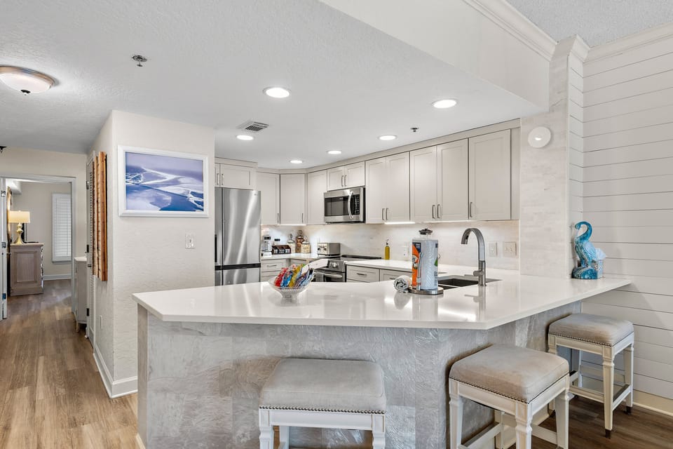 Cook meals in your fully stocked and Remodeled kitchen with Gulf Views - Welcome to your home away from home at Jade East 420!