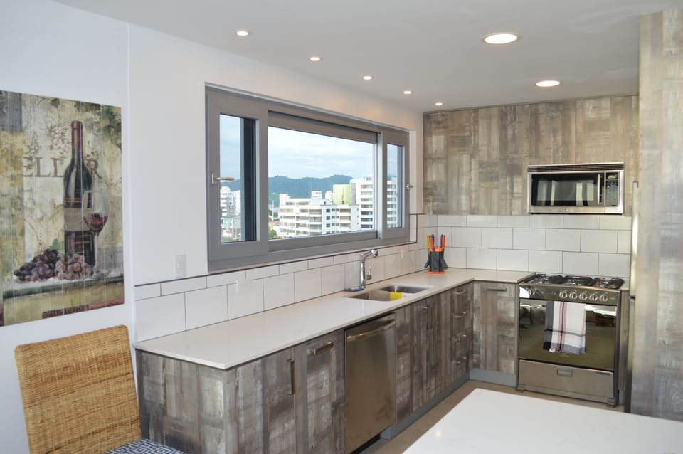 Huge window looking out at the ocean while you're doing the dishes. 