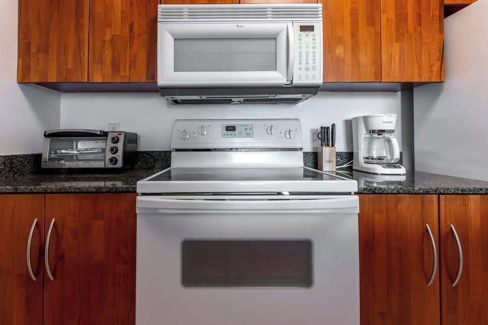 Fully equipped kitchen with complete set of cookware