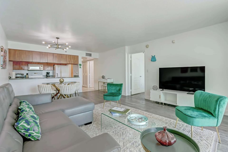 Bright living area with comfortable seating and bay views