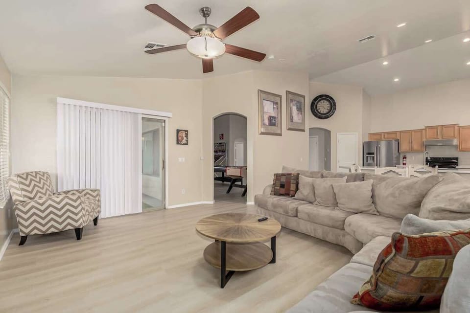 Bright living room with comfortable seating and smart TV