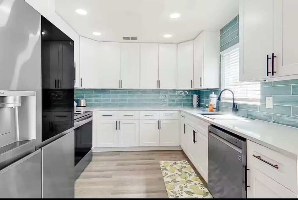 Fully stocked kitchen with modern appliances and everything you need to cook at home.