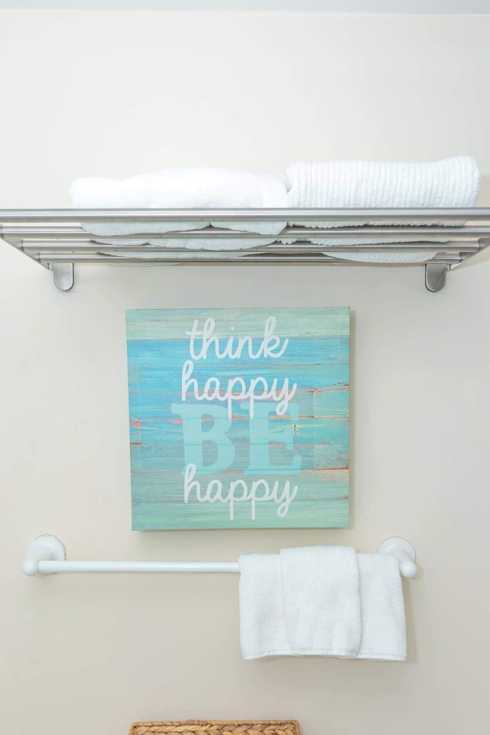 Clean bathroom with fresh towels and essentials