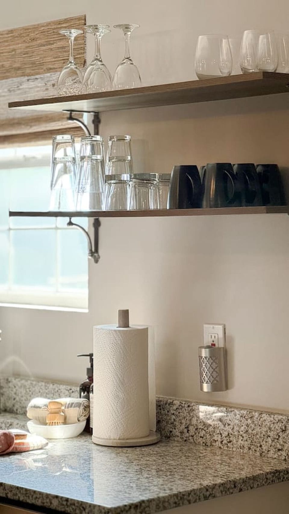 Kitchen: Modern design meets practicality with sleek countertops and stylish glassware. Cheers!