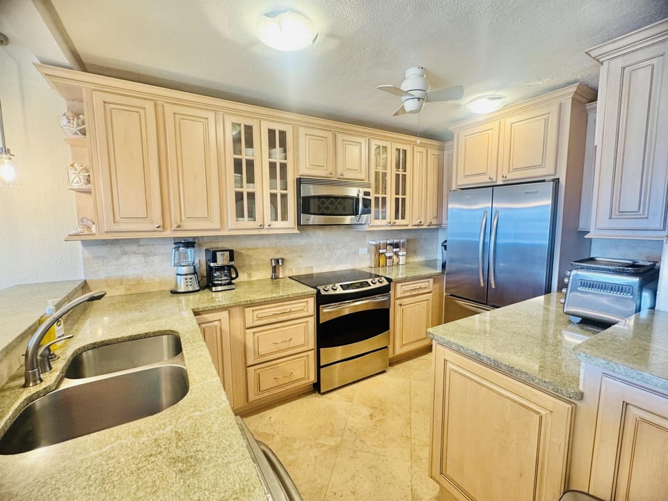 Bright, spacious kitchen with modern appliances and ample storage