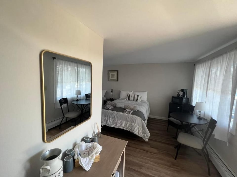 Comfort Quadruple Room, Non Smoking | Individually decorated, individually furnished, desk, laptop workspace