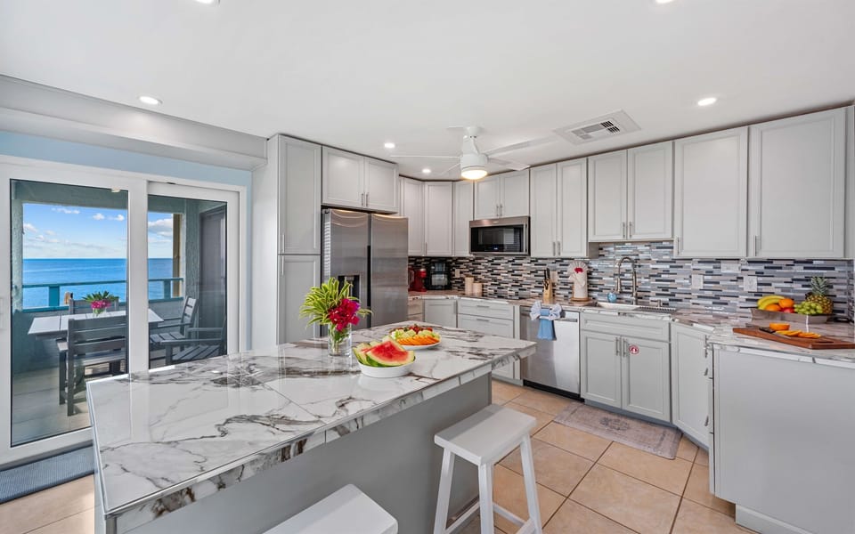 Open plan kitchen with views from every window