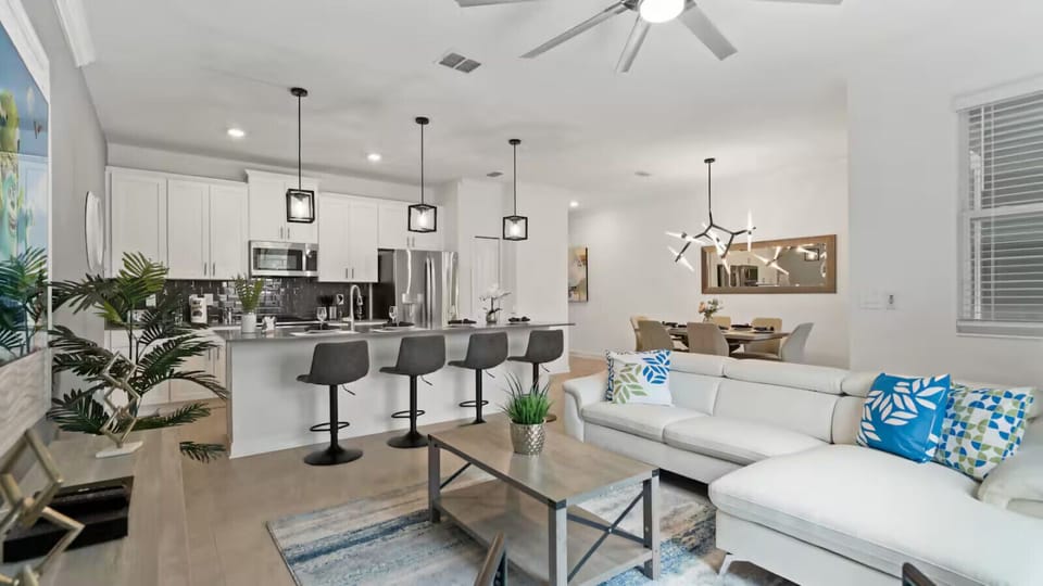 Your own private oasis awaits in the open living and dining space