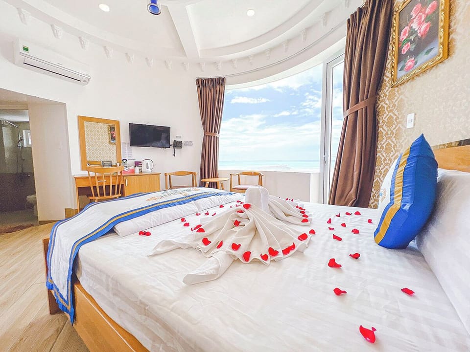 Premium Double Room, 1 King Bed, Beach View, Sea Facing | Minibar, desk, laptop workspace, blackout drapes