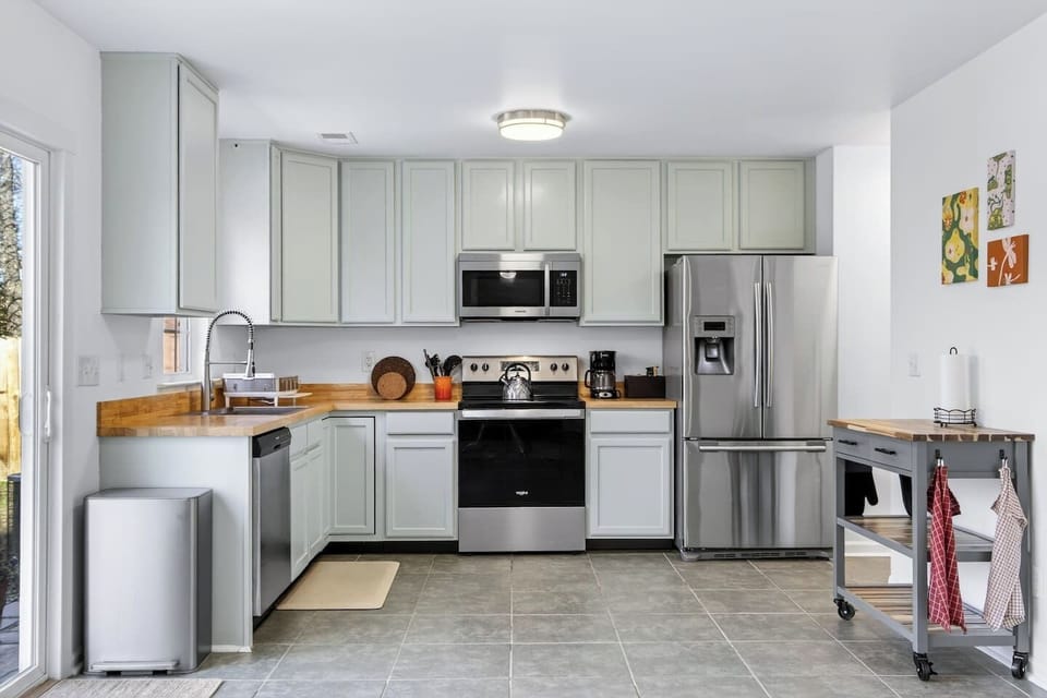 Fully equipped kitchen with modern appliances and plenty of counter space.