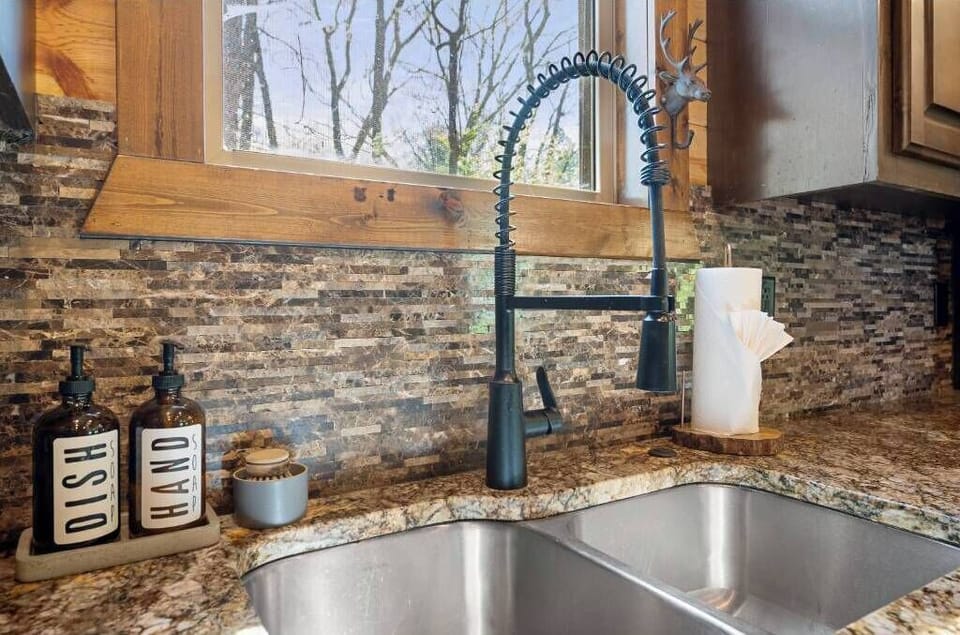 Farmhouse sink with dual basins makes cleanup easy and stylish.