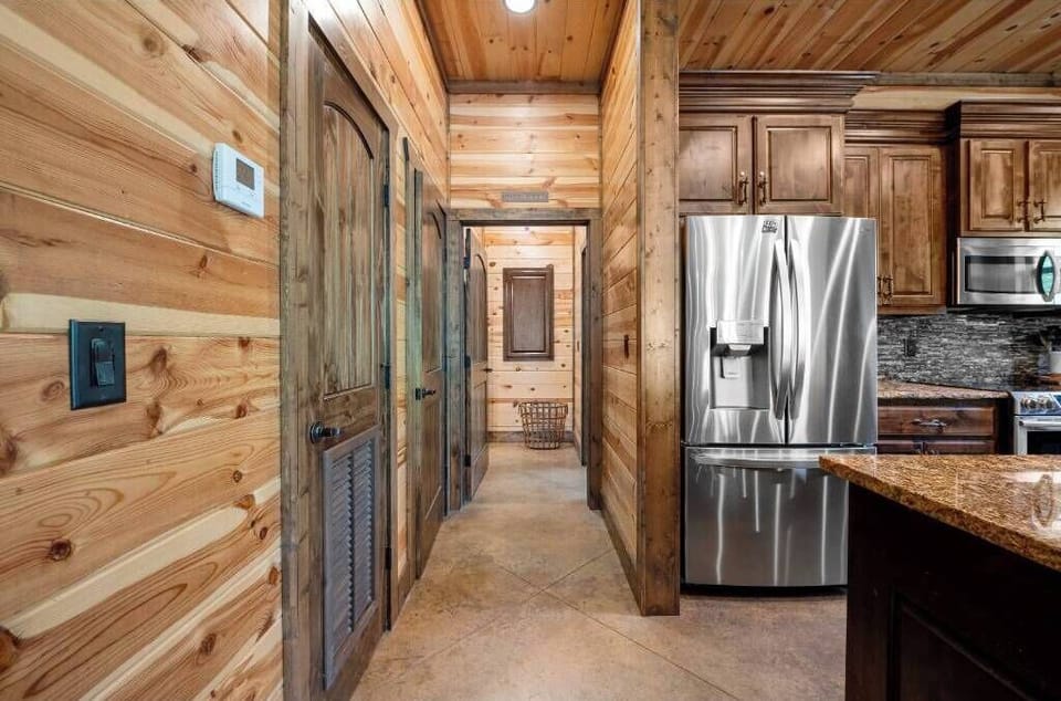 Stainless steel appliances and double-door fridge make cooking easy.