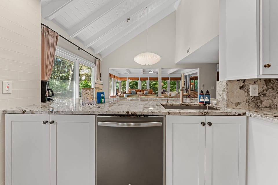 Chef's kitchen with propane range and stainless appliances