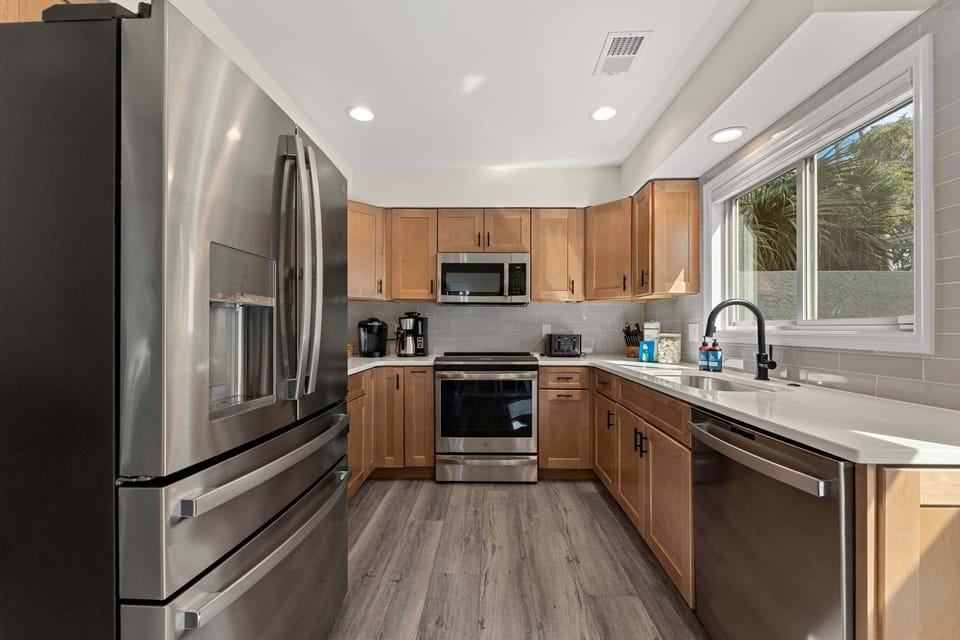 Updated kitchen with modern stainless appliances