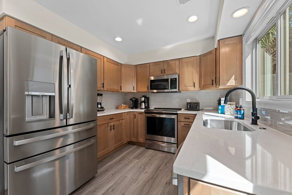 Updated kitchen with modern stainless appliances