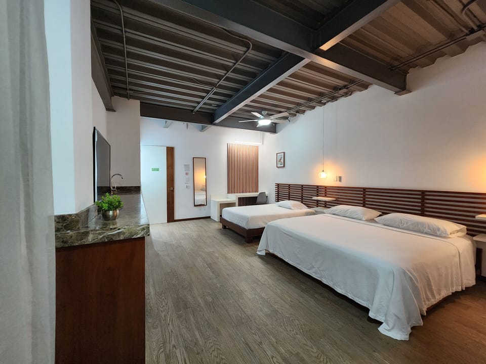 Standard Quadruple Room | Desk, laptop workspace, iron/ironing board, free WiFi