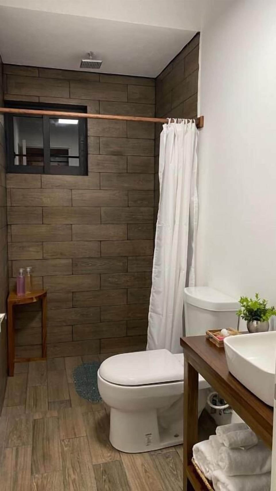 Shower, towels, soap, shampoo