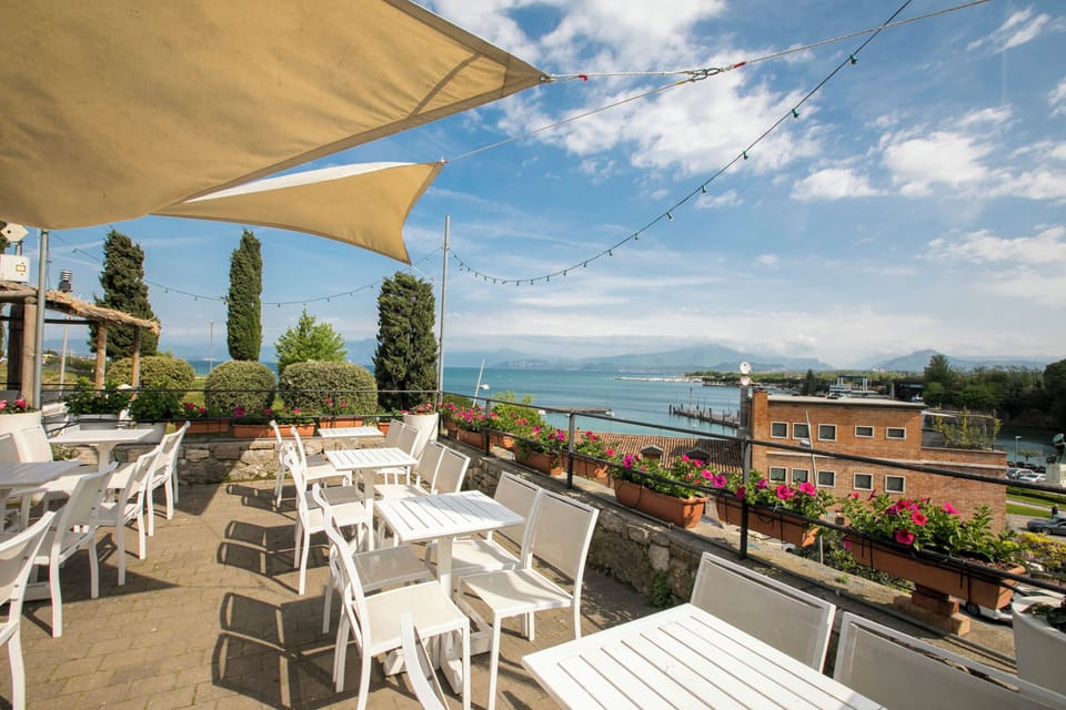 a wonderful view over the lake and Peschiera from the terrace of a bar