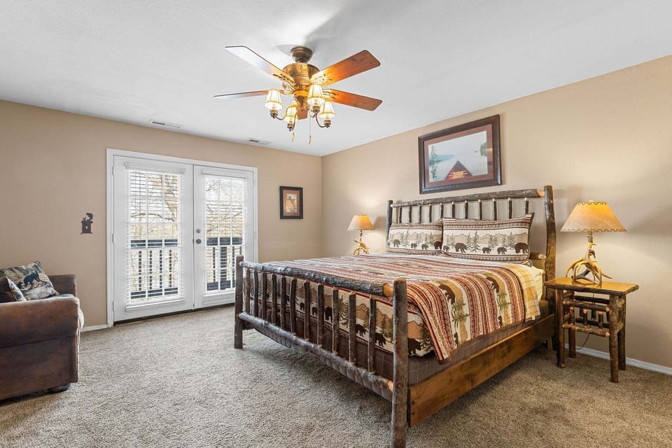 Bedroom 2- Upstairs- King Bed, Satellite TV, Upstairs Deck Access, Attached Bath