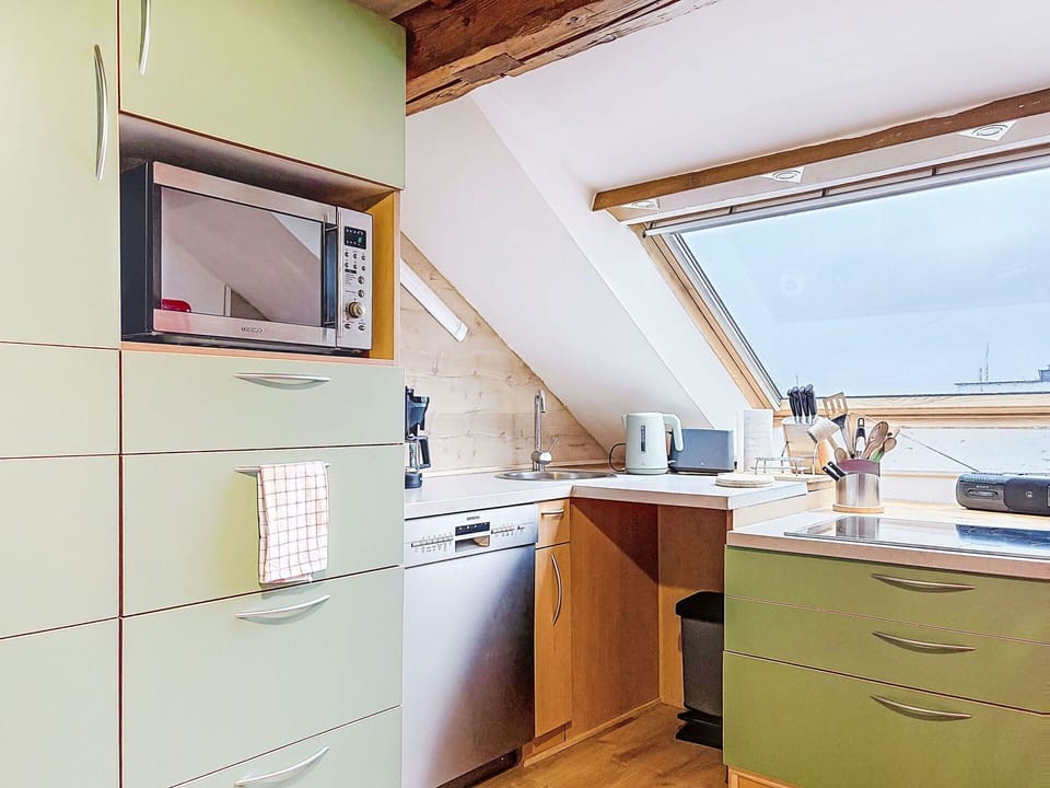 Kitchen, Interior Design, Wood, Flooring, Cabinetry, Furniture, Kitchen Appliance, Countertop, Major Appliance, Floor