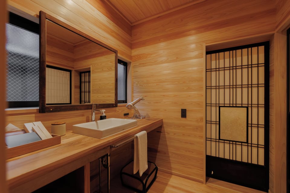Economy Twin Room | Bathroom | Separate tub and shower, hair dryer, slippers, towels